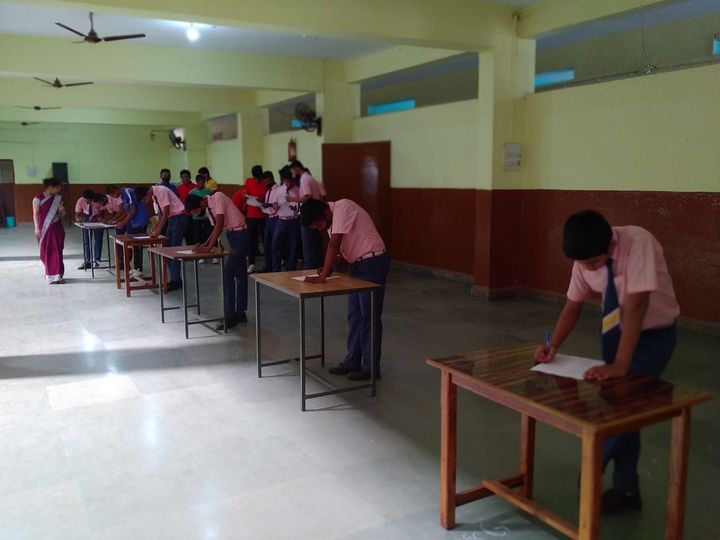 Students at an activity in the school hall