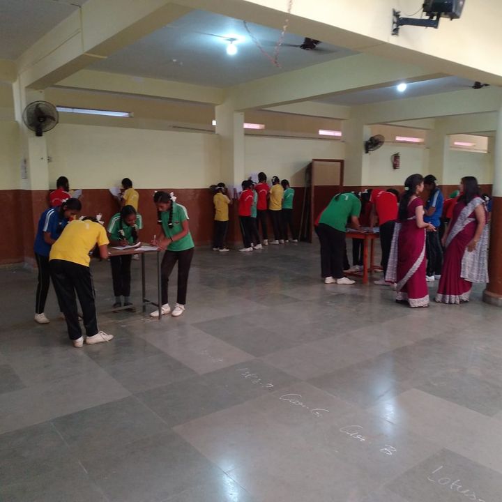 Students taking part in a hall activity