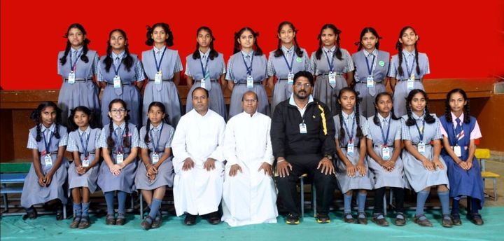 Girls with teachers - class photo